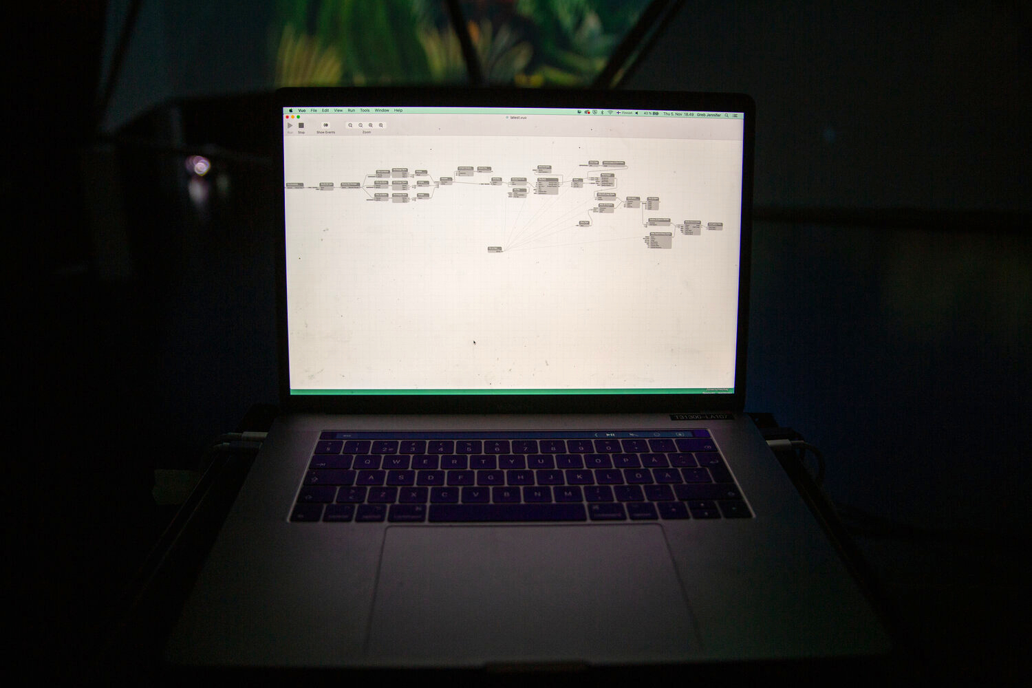 An open Mac laptop showing a Vuo composition.